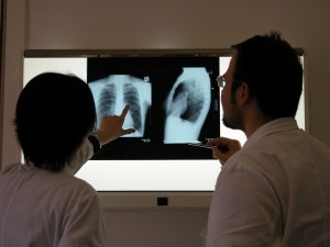 Photo of doctors looking at an x-ray