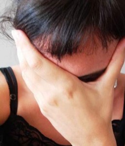 Woman displaying signs of stress