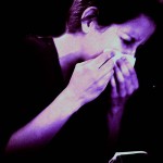 a woman sneezing