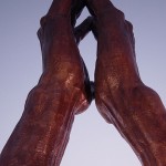 Photo of praying hands sculpture
