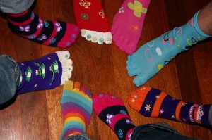 Photo of feet in toe socks
