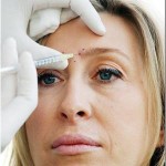 Photo of woman receiving a facial injection