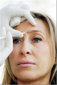 Photo of woman receiving a facial injection