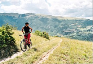 Photo of a person mountain biking