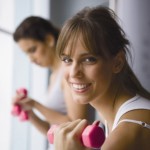 Photo of a woman with handweights
