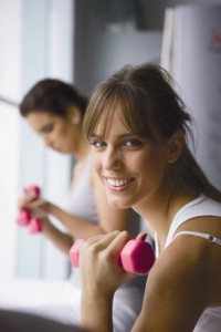 Photo of a woman with handweights