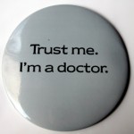 Photo of a badge saying "Trust me I'm a doctor"