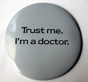 Photo of a badge saying "Trust me I'm a doctor"