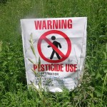 Photo of a warning sign for pesticides