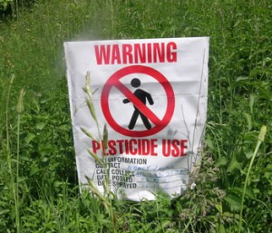 Photo of a warning sign for pesticides