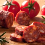 Photo of chorizo sausage on a chopping board