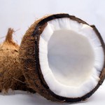 Photo of a coconut exposing the inner flesh