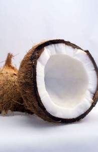 Photo of a coconut exposing the inner flesh