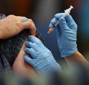 Photo of a flu shot being administered