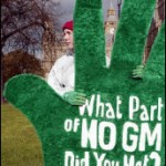 Photo of a woman carrying a 'No GMO' sign