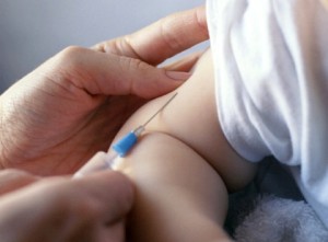 Photo of a child recieving a vaccination