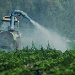 Photo of pesticides being sprayed in a field