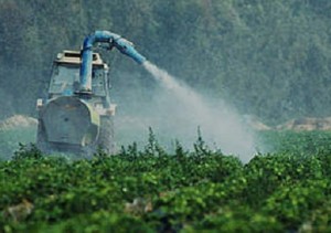 Photo of pesticides being sprayed in a field