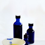 Photo of blue bottles and essential oils