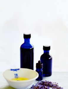 Photo of blue bottles and essential oils