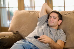 Photo of a man watching TV