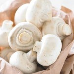 Photo of white mushrooms in a bag