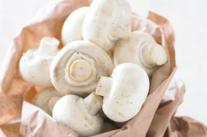Photo of white mushrooms in a bag