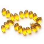 Photo of vitamin capsules in the shape of a fish