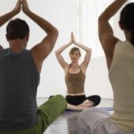 Photo of adults in a yoga class