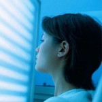 Photo of a woman using light therapy