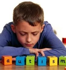 Photo of a boy thinking about autism