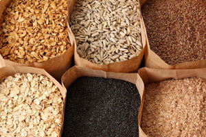 Photo of paper bags full of wholegrains