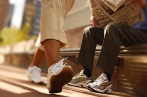 Photo of a woman's feet walking in the city