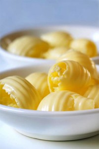 Photo of curls of butter in a dish