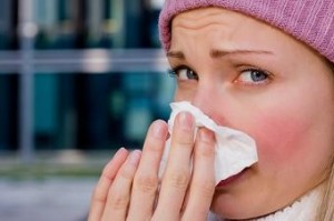 Photo of a young woman with a cold