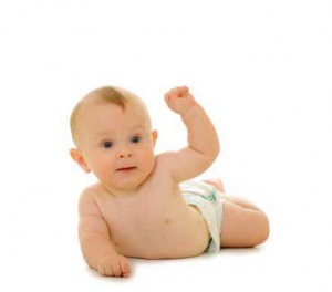 Photo of a baby lifting itself up on its own arms