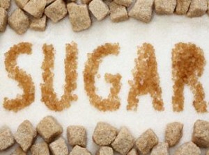 Photo of the word 'sugar' spelled out in granulated sugar