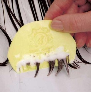 Photo of a nit comb being used on hair