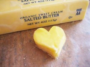 Photo of a pat of butter in the shape of a heart