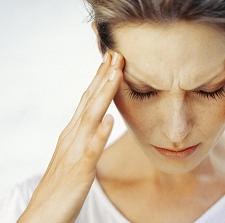 Photo of a woman with a migraine