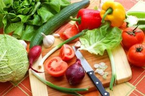 Photo of fresh vegetableson a chopping board