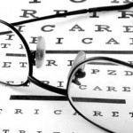 Photo showing glasses and an eye test