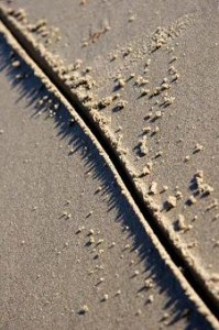 Photo of a line drawn in the sand