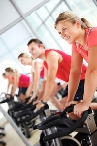 photo of men and women at the gym