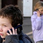 photo of children on mobile phones