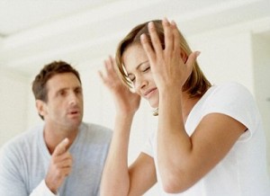 Photo of a man and a woman arguing