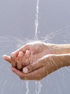 Photo of a hand under running water