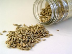 Photo of fennel seeds spilling out of a jar