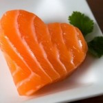 Photo of a salmon filet in the shape of a heart