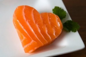 Photo of a salmon filet in the shape of a heart